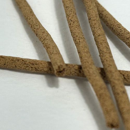 Close-up of brown costus incense sticks